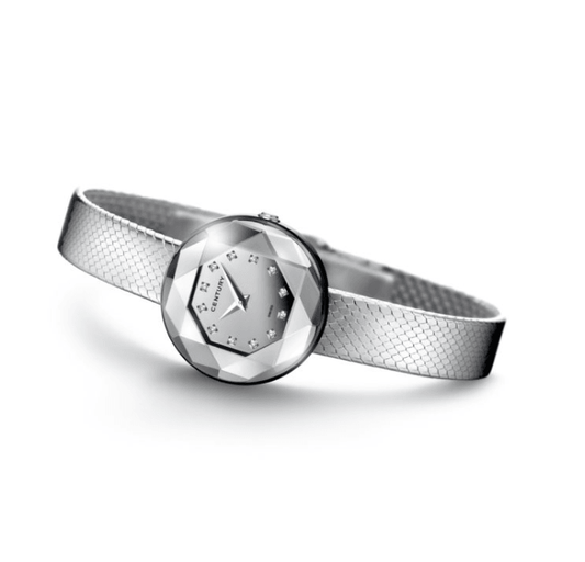 CONTÉVANOU elegant silver wristwatch with a faceted crystal dial and diamond hour markers on a textured mesh band