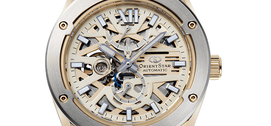 Contévanou close-up of Orient Star automatic mechanical watch with skeleton dial and gold accents