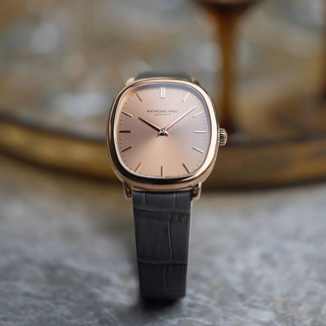 CONTÉVANOU rose gold square watch with minimalist dial and black leather strap