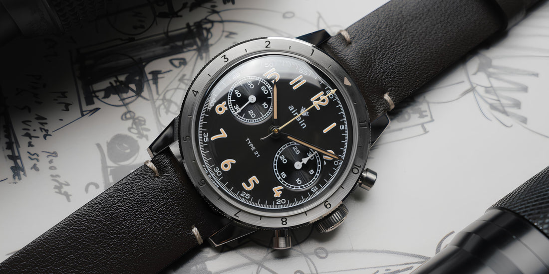Contévanou airain TYPE 21 black dial watch with leather strap on sketches background, mechanical chronograph wristwatch