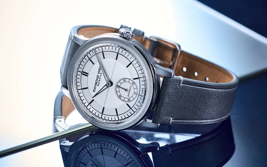 Contévanou Raymond Weil Genève automatic wristwatch with black leather strap and white dial