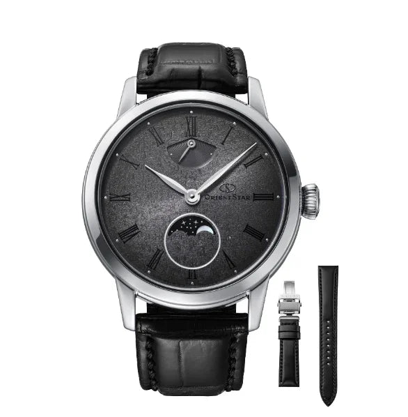 Luxury mechanical wristwatch with black leather strap, moonphase dial, and extra band